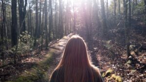 woman-on-the-forest-path-David-Besh-pexels-298563